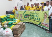 HUT Partai Golkar, Dr Maruli Siahaan Bagi Sembako di Tebingtinggi